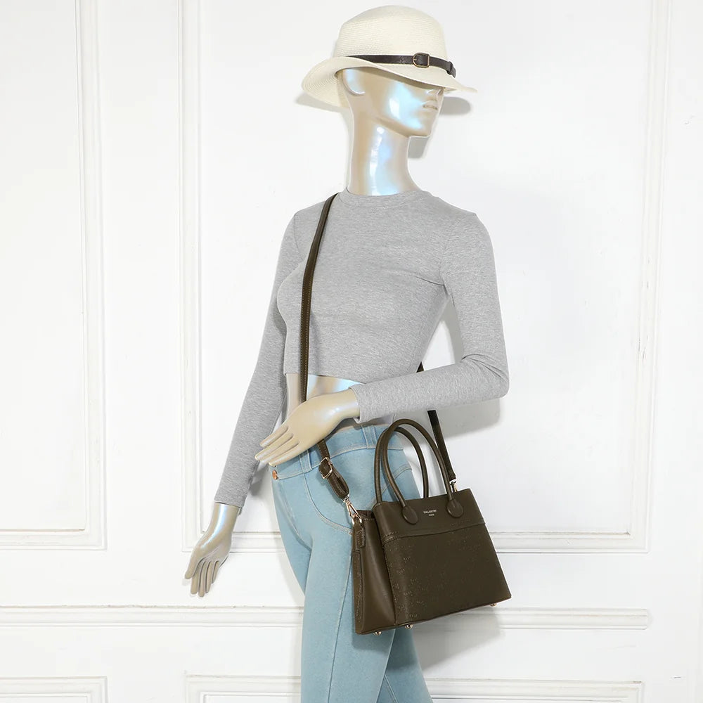 Sac à main femme Le Mélys vert foncé porté, à la main ou en bandoulière grâce à sa sangle amovible – réf. R-2072