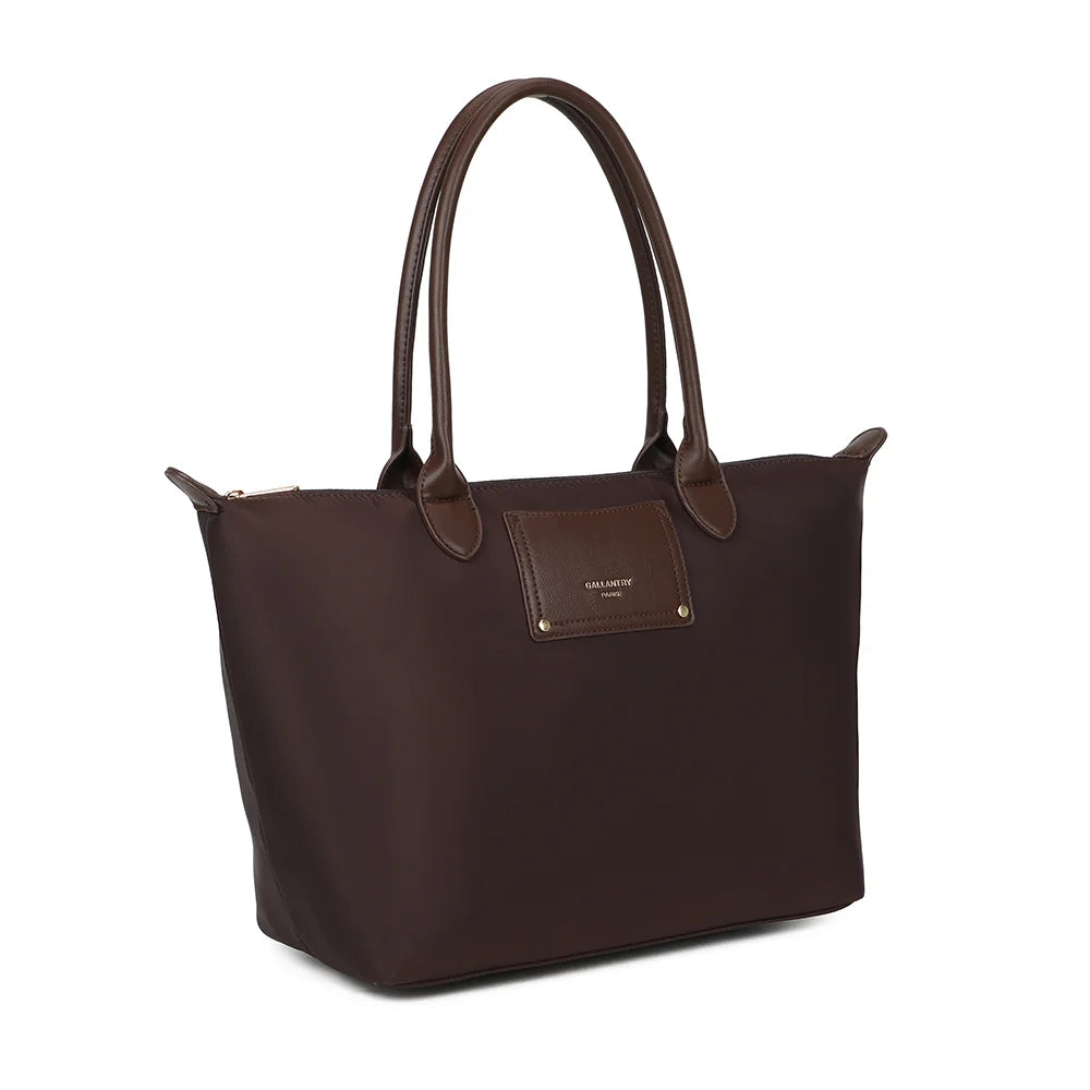 Le Meralis café de trois quarts : silhouette évasée, longues anses marron et fermeture zippée – réf. Z-06-1