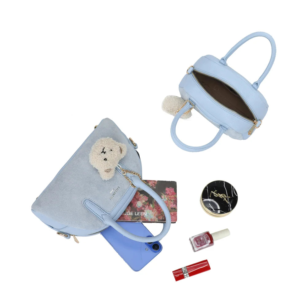 Intérieur du Mistral bleu clair : fermeture zippée, poche zippée et place pour smartphone et maquillage – réf. R-2070