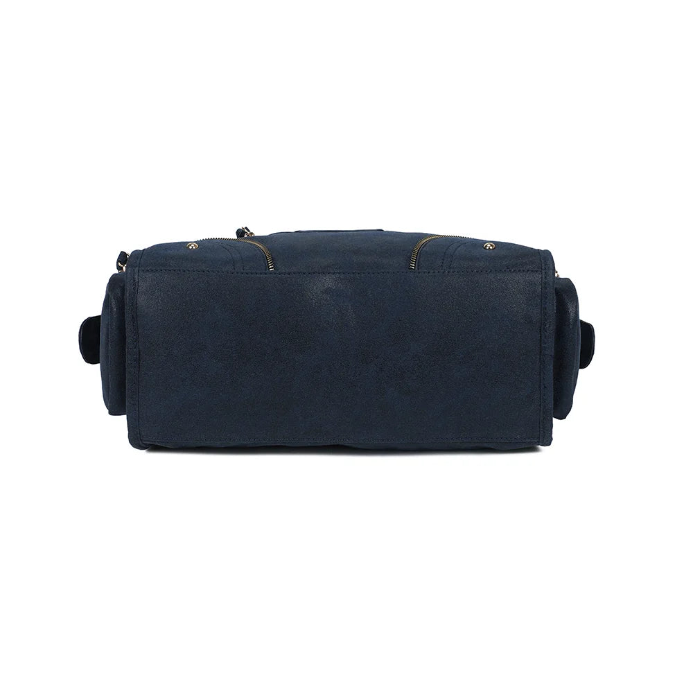 Dessous du Le Montana en bleu foncé, une base structurée qui garde la forme bowling du sac – réf. R-2074-1