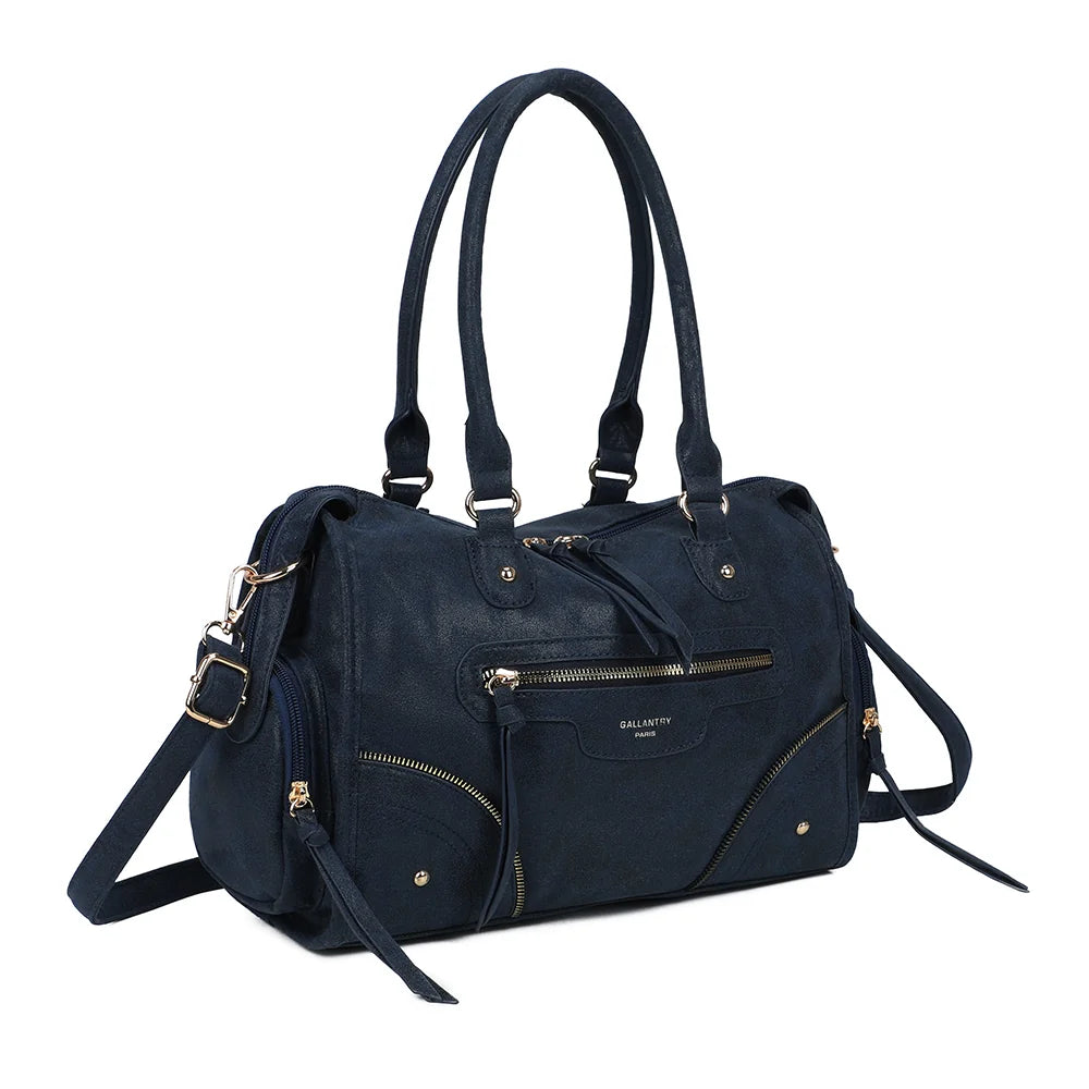 Le Montana en bleu foncé vu de trois quarts : silhouette bowling structurée et poche zippée latérale – réf. R-2074-1