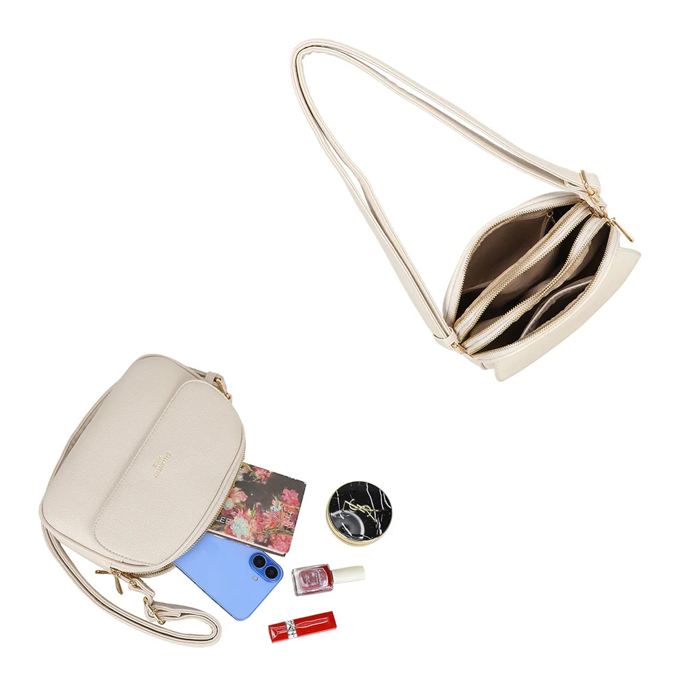 Le Naëlia beige ouvert : plusieurs compartiments zippés pour le téléphone et les essentiels – réf. A-9137-1