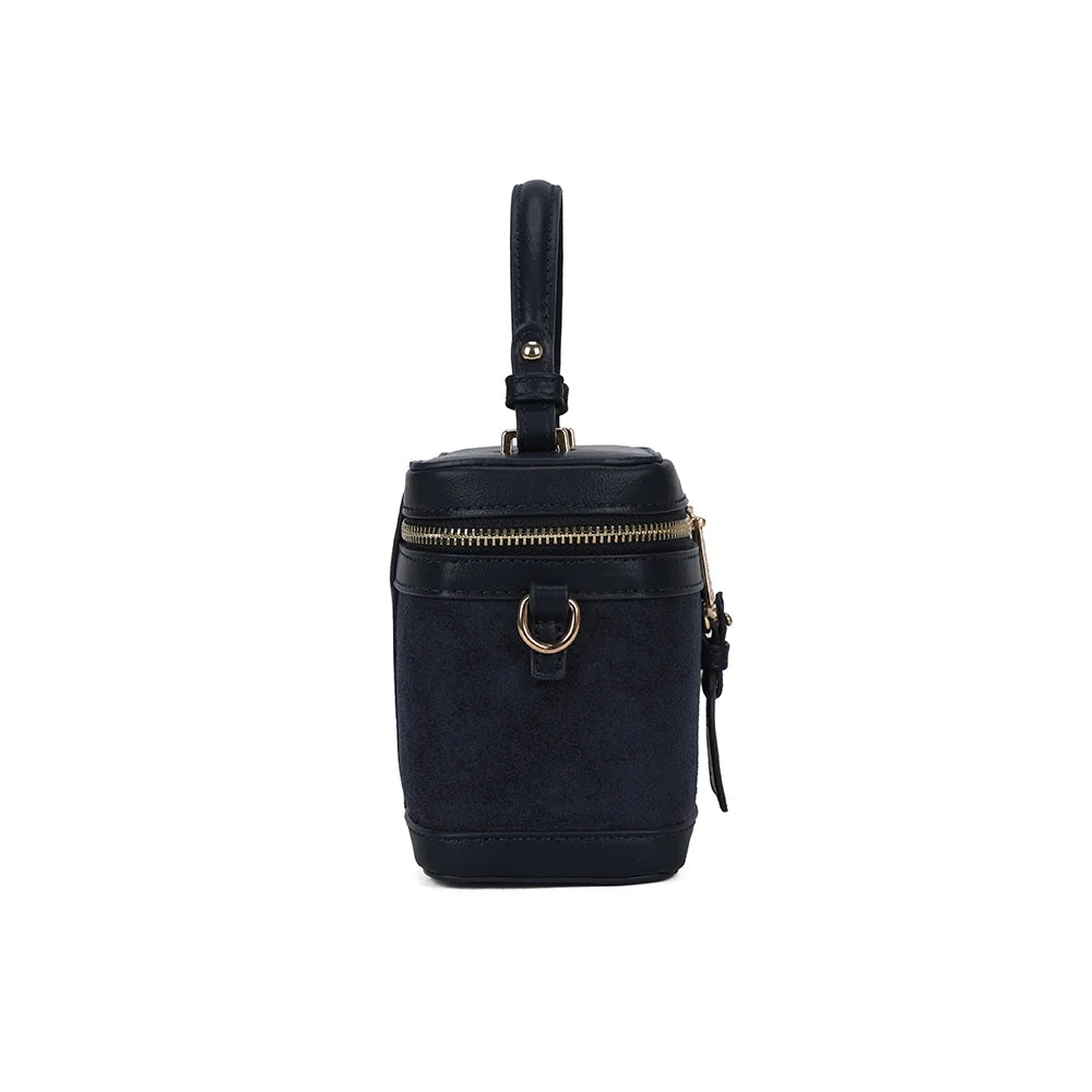 Le Nohé bleu foncé de profil : anneau doré pour la bandoulière et format compact de 9 cm de profondeur – réf. A-9187