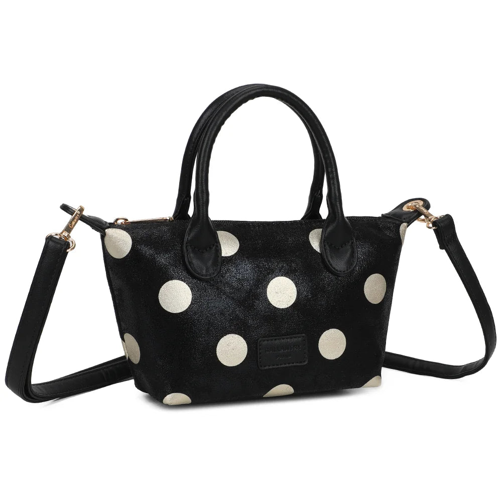 Le Polka noir vu de trois quarts : silhouette trapèze compacte et plaque logo sur le devant – réf. Z-05-10