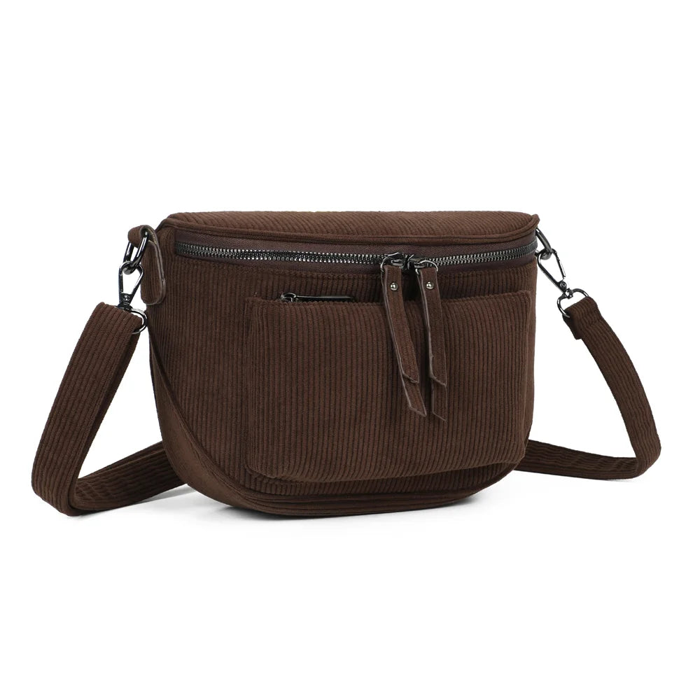 Le Sacha café vu de trois quarts : forme demi-lune compacte et zip principal à double curseur – réf. Z-83047-7