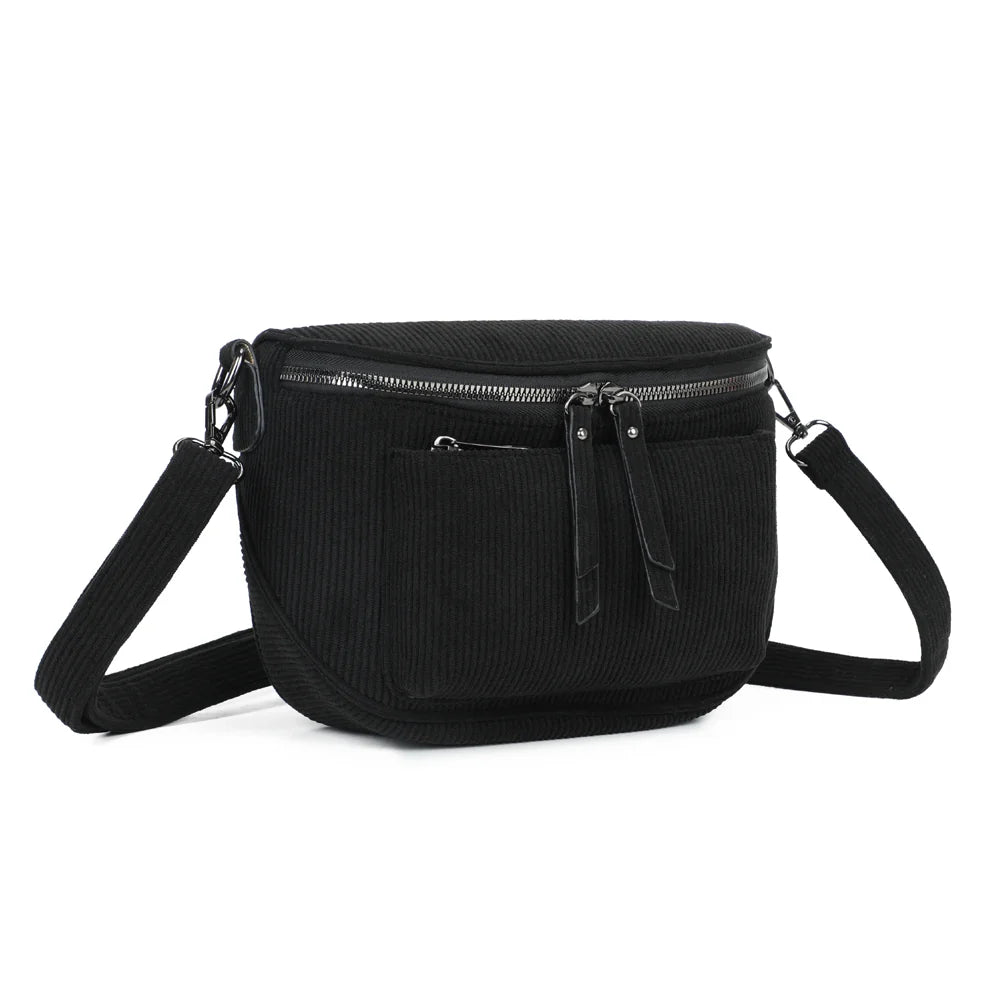 Le Sacha noir vu de trois quarts : forme demi-lune compacte et zip principal à double curseur – réf. Z-83047-7