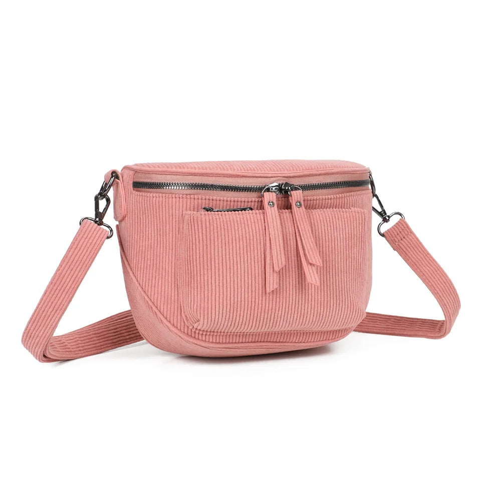 Le Sacha rose foncé vu de trois quarts : forme demi-lune compacte et zip principal à double curseur – réf. Z-83047-7