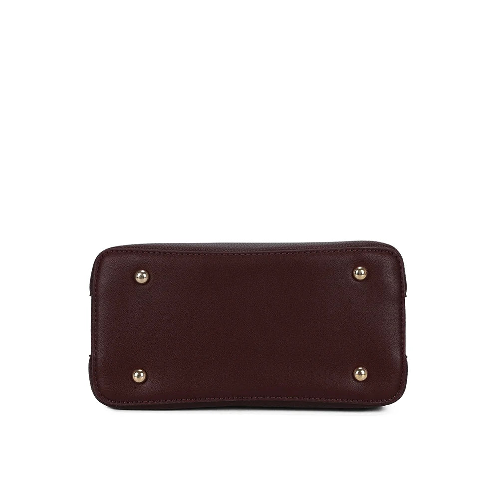 Fond plat du Le Solvane bordeaux, pour un sac à main qui tient bien posé sur une table ou un bureau