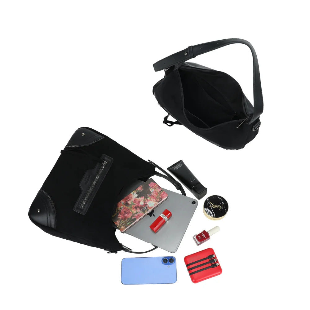 Intérieur zippé du Songe noir : plusieurs poches, place pour une tablette, un téléphone et la trousse – réf. Z-83095