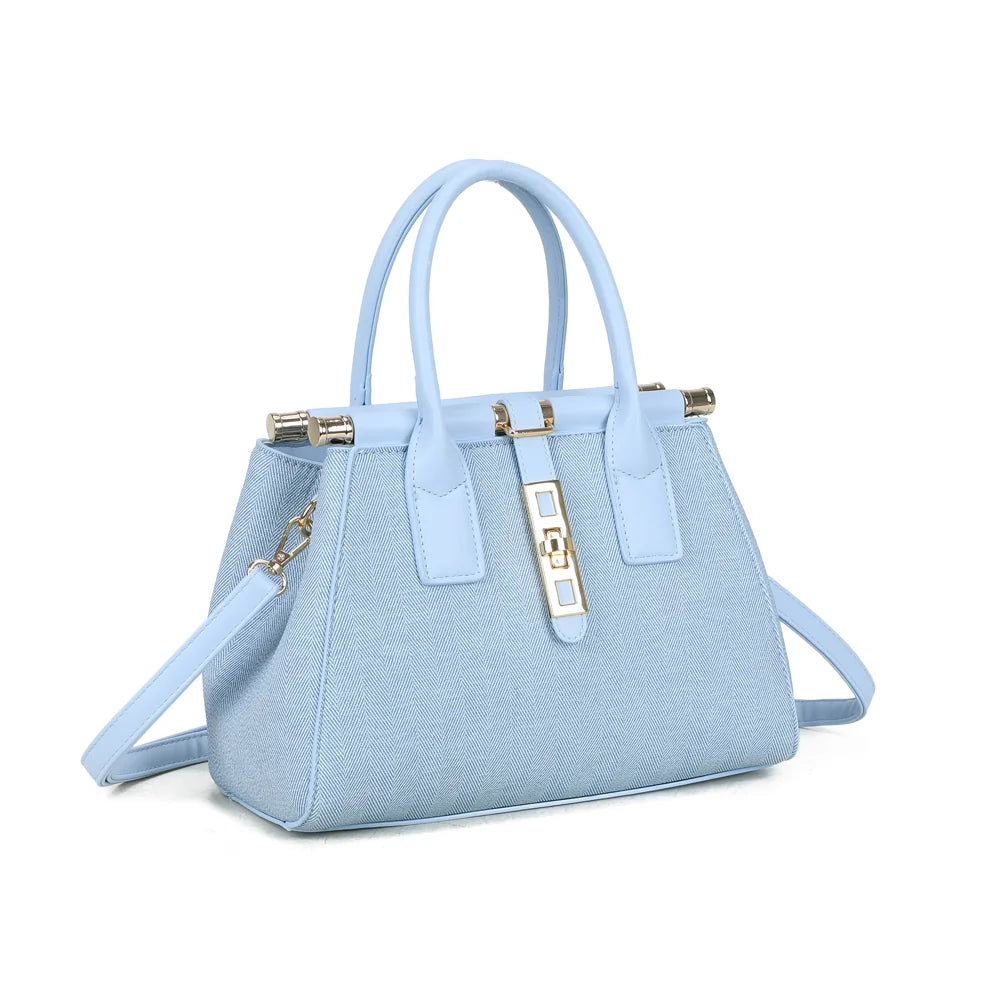 Loria Signature bleu clair vu de trois quarts : silhouette structurée et cadre à embouts dorés – réf. A-9165