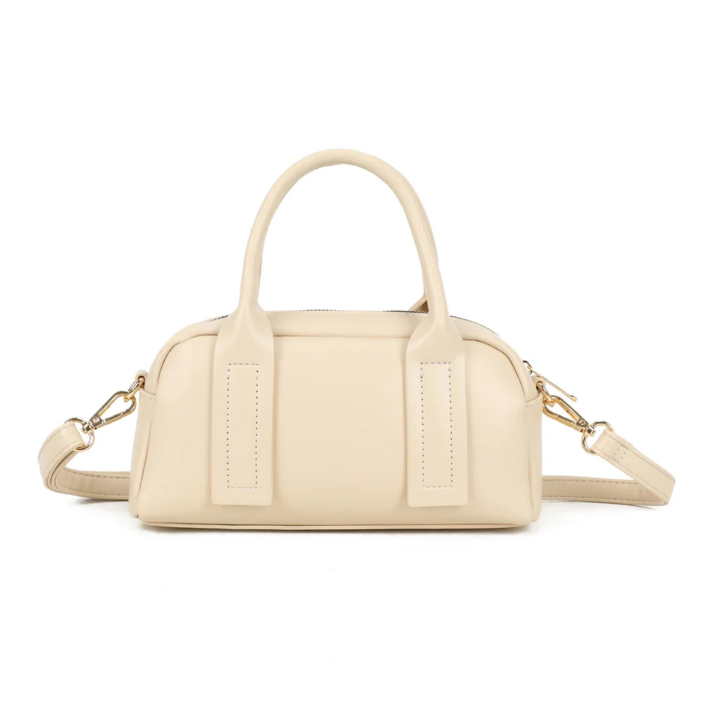 Dos du sac Lya beige : surface synthétique lisse, pattes d’anses surpiquées et silhouette compacte – réf. KJ-62067