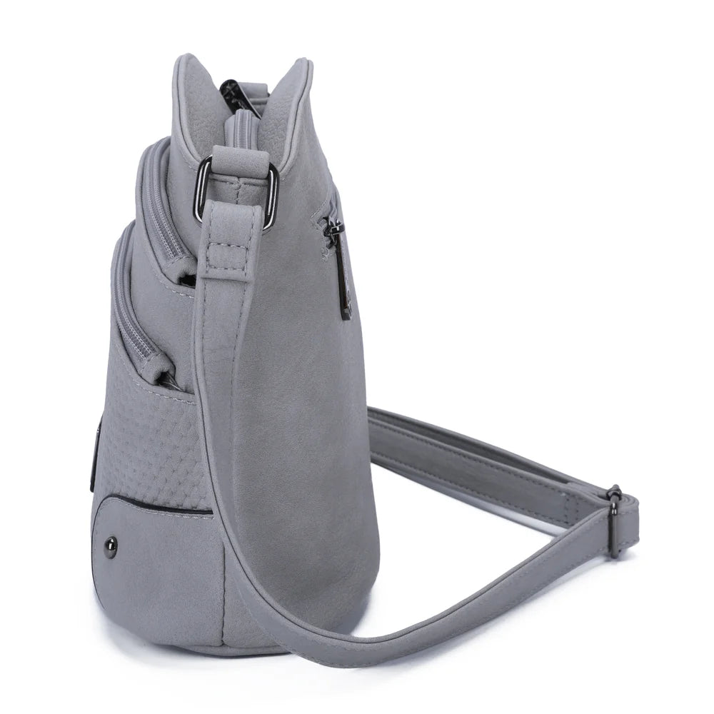 Profil du Marceau gris : volume compact de 12 cm de profondeur et bandoulière réglable – réf. M-9263-5
