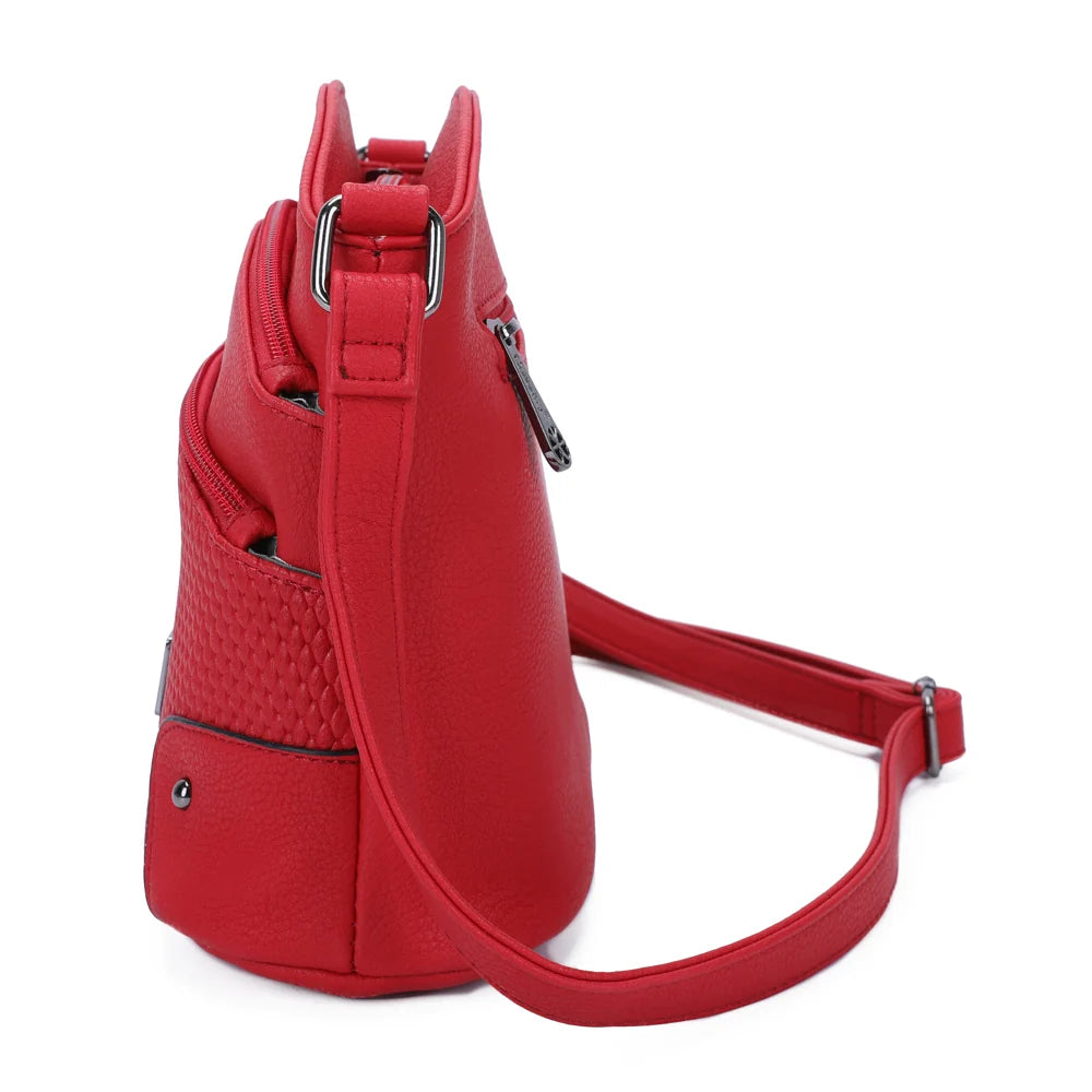 Profil du Marceau rouge : volume compact de 12 cm de profondeur et bandoulière réglable – réf. M-9263-5