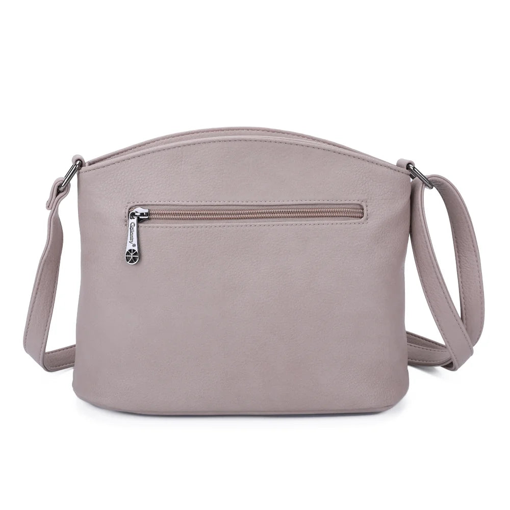 Dos du Marceau taupe, simili cuir grainé et anneaux métalliques d’attache de la bandoulière – réf. M-9263-5