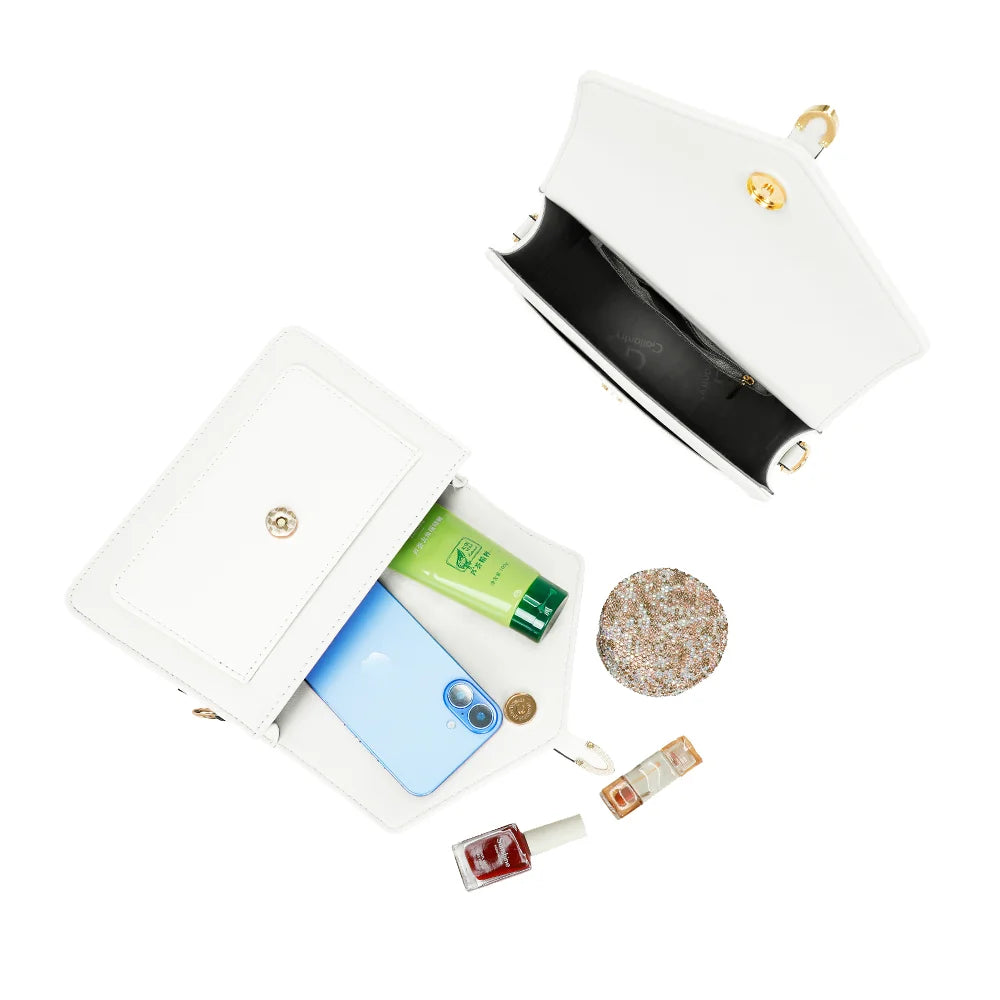Intérieur du Marina blanc : compartiment principal et poche zippée pour ranger les petits objets – réf. C-0160-1