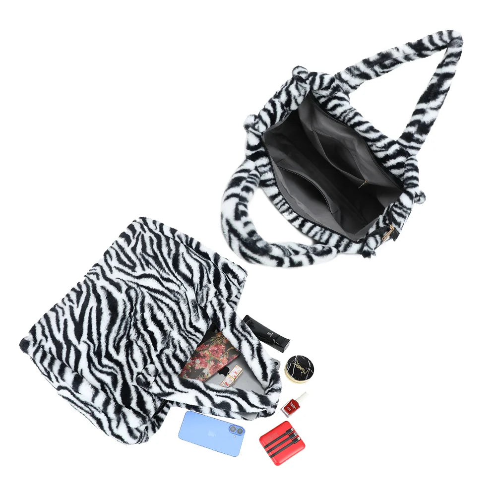 Intérieur du Mélya zebre : fermeture zippée et poche intérieure zippée à tirette dorée – réf. DG-5802