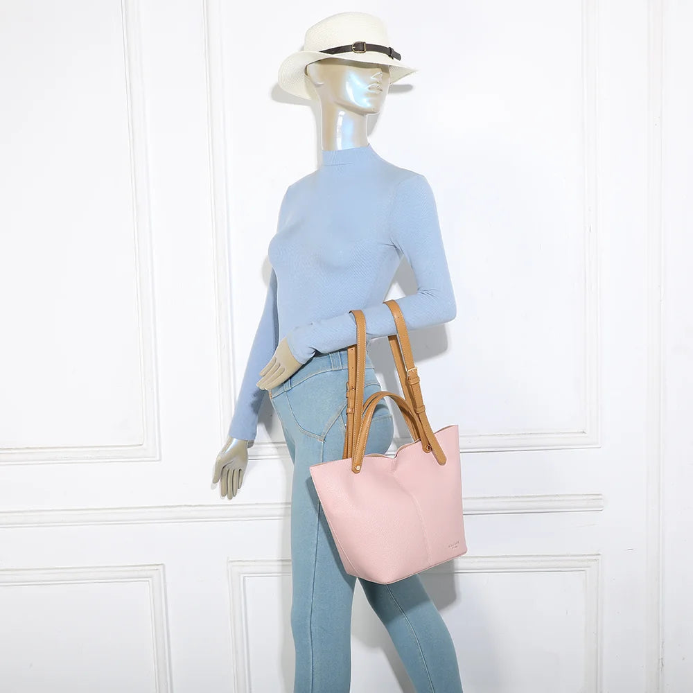 Sac Milan Élégance rose porté par une femme, à la main ou à l’épaule avec sa sangle ajustable – réf. G-7508