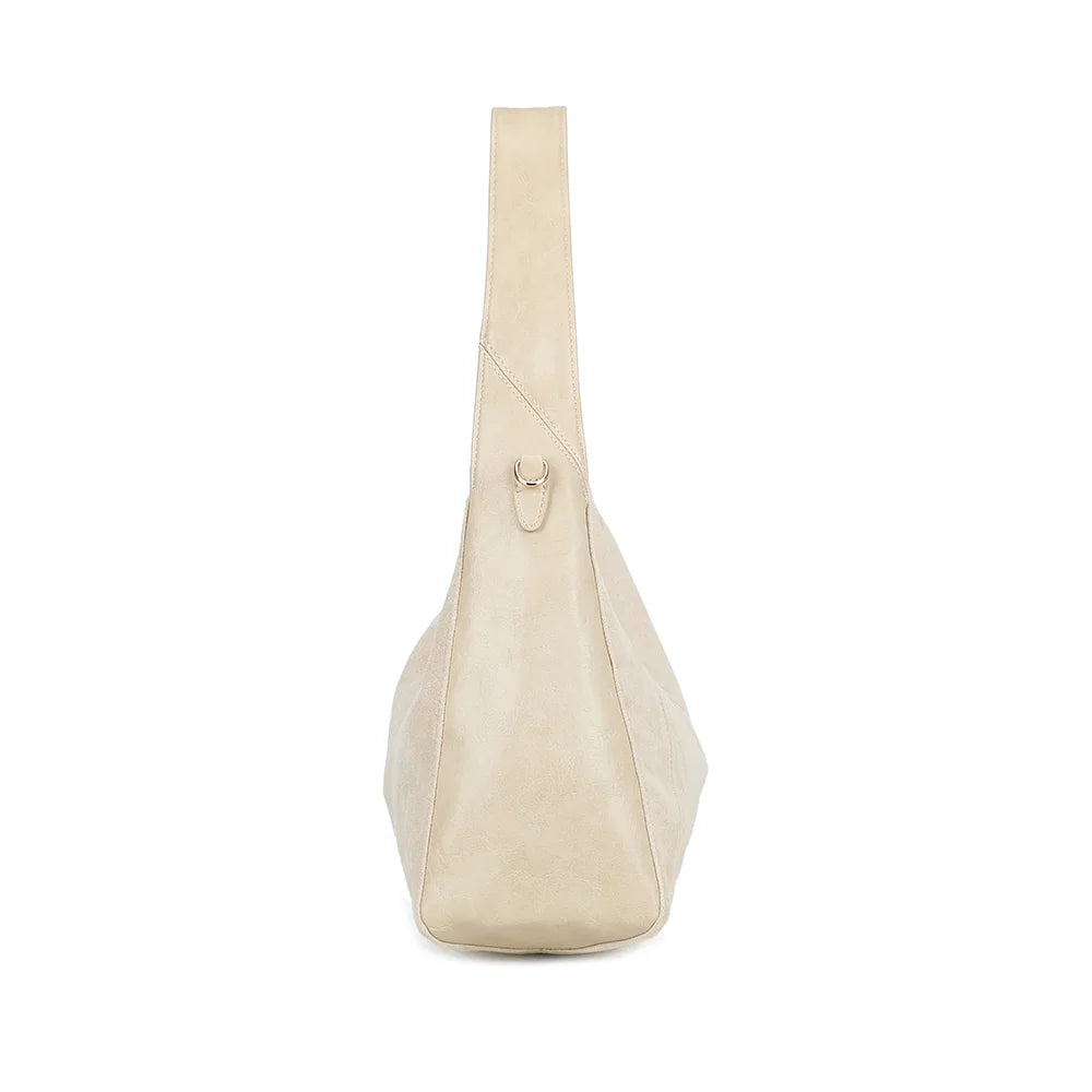Profil du Milano beige : côté lisse et anneau métallique pour fixer la bandoulière réglable – réf. HS-43002