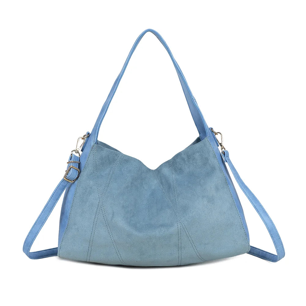 Dos du sac Milano bleu clair, façade suédée et anse d’épaule unique au tombé naturel – réf. HS-43002