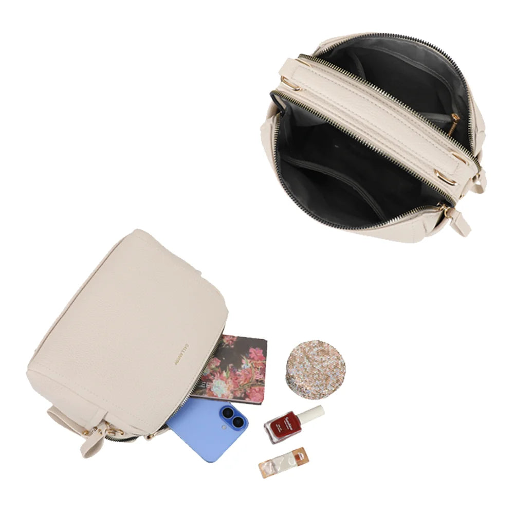 Intérieur du Mini Boston Élégance beige : deux compartiments zippés et poches, doublure synthétique – réf. KJ-62060