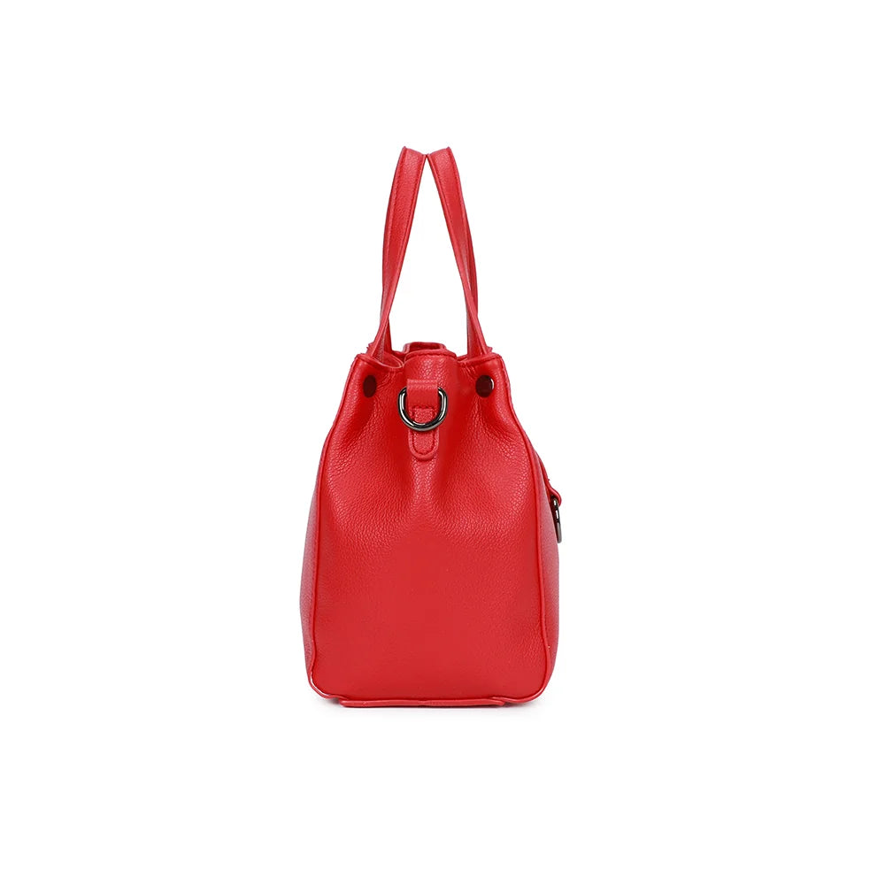 Profil du Mini Léna rouge : 12 cm de profondeur et anneau latéral pour la bandoulière amovible – réf. R-1692-2