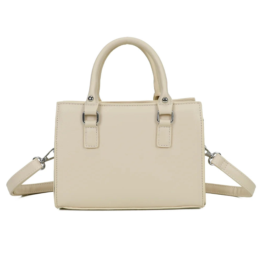 Dos du Minimal Chic beige, surface lisse et surpiqûres apparentes sur toute la silhouette – réf. KJ-62058