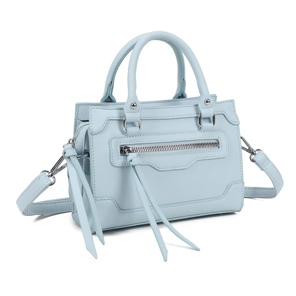 Minimal Chic bleu clair vu de trois quarts : lignes nettes, anses courtes et longue tirette de zip – réf. KJ-62058