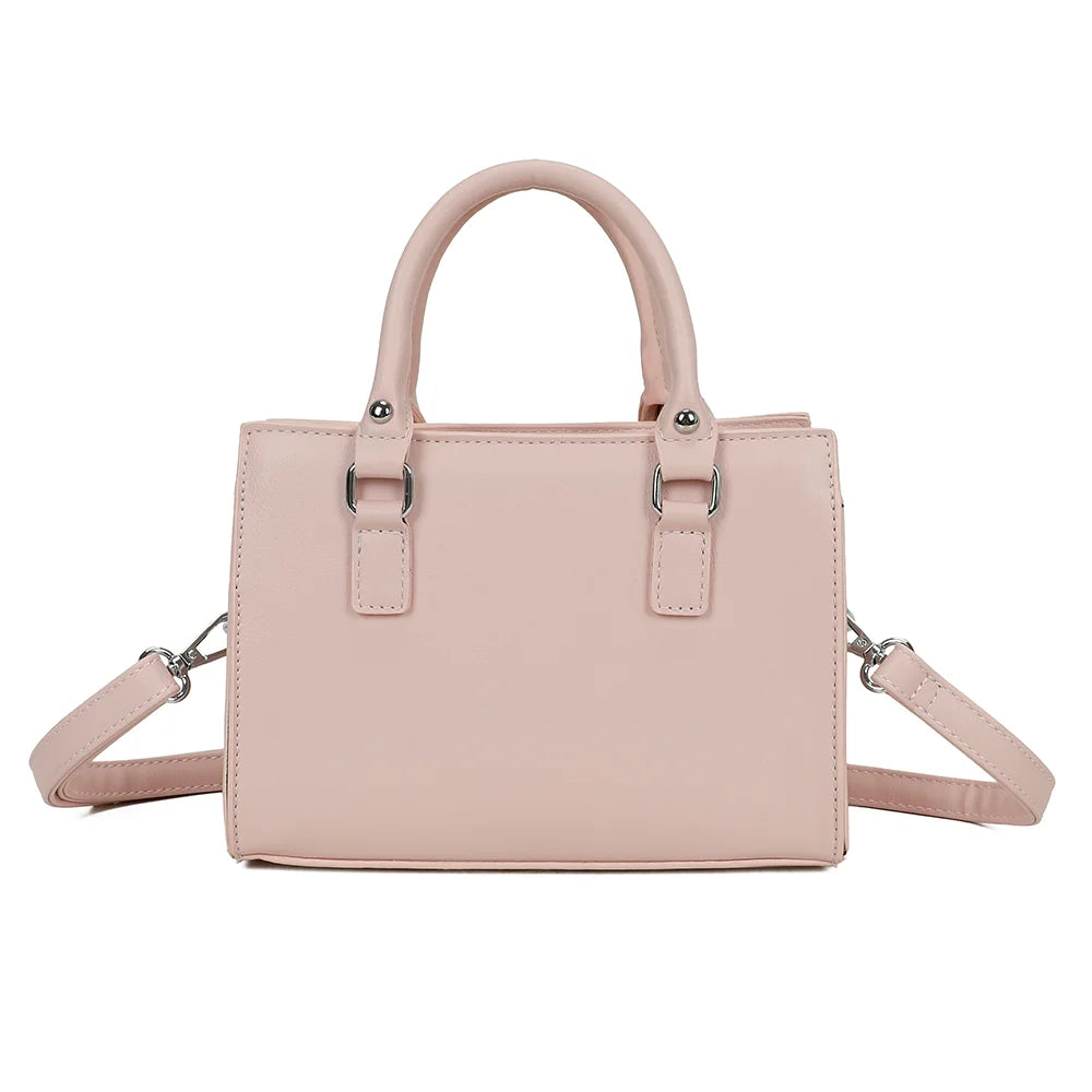 Dos du Minimal Chic rose, surface lisse et surpiqûres apparentes sur toute la silhouette – réf. KJ-62058