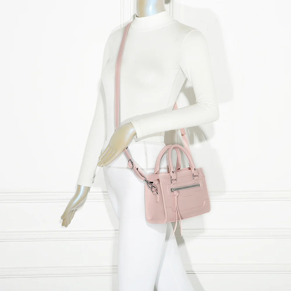 Sac à main femme Minimal Chic rose porté à la main, format compact pour la ville – réf. KJ-62058