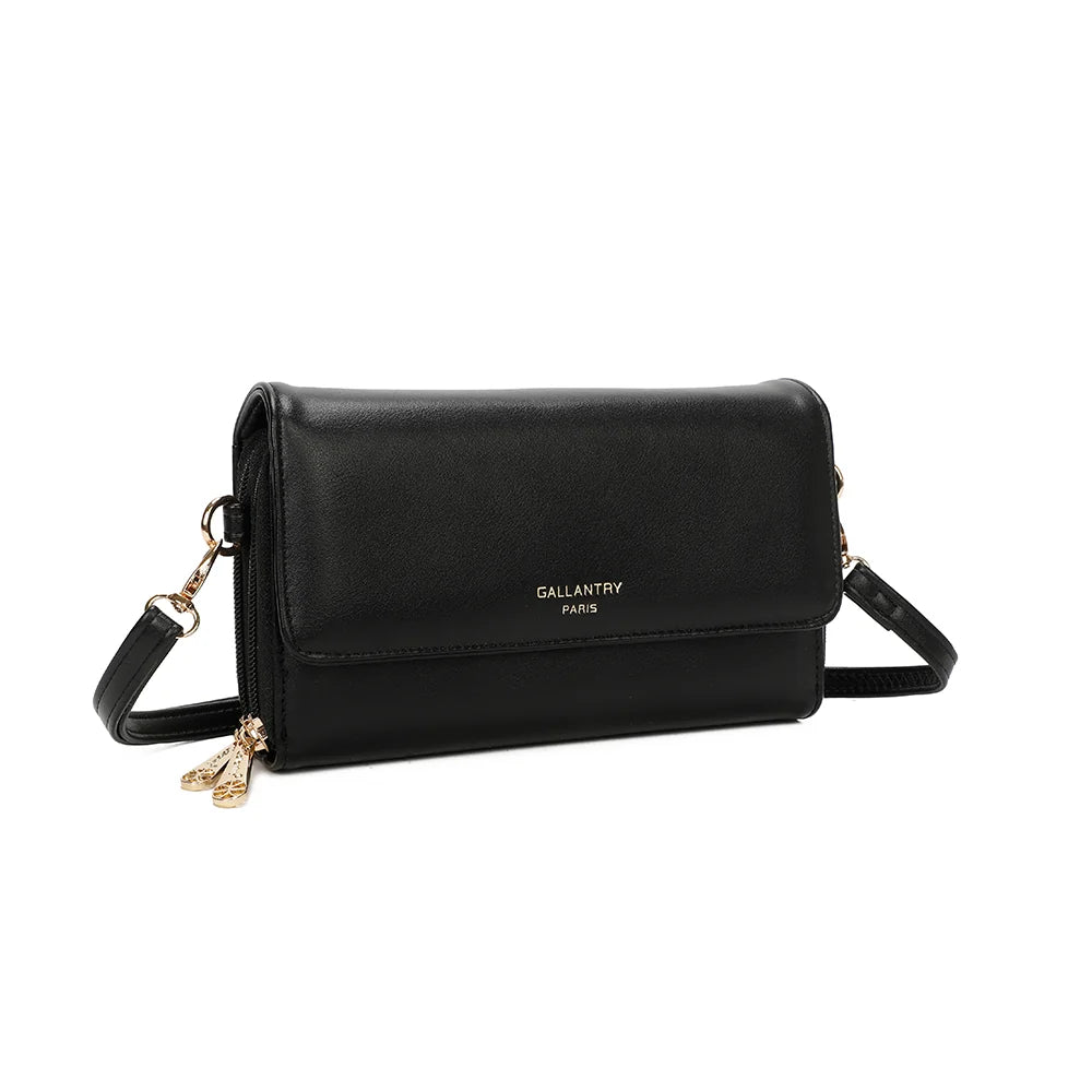 Naélys noir de trois-quarts : rabat lisse, côtés zippés et doubles tirettes dorées – réf. SF-69025