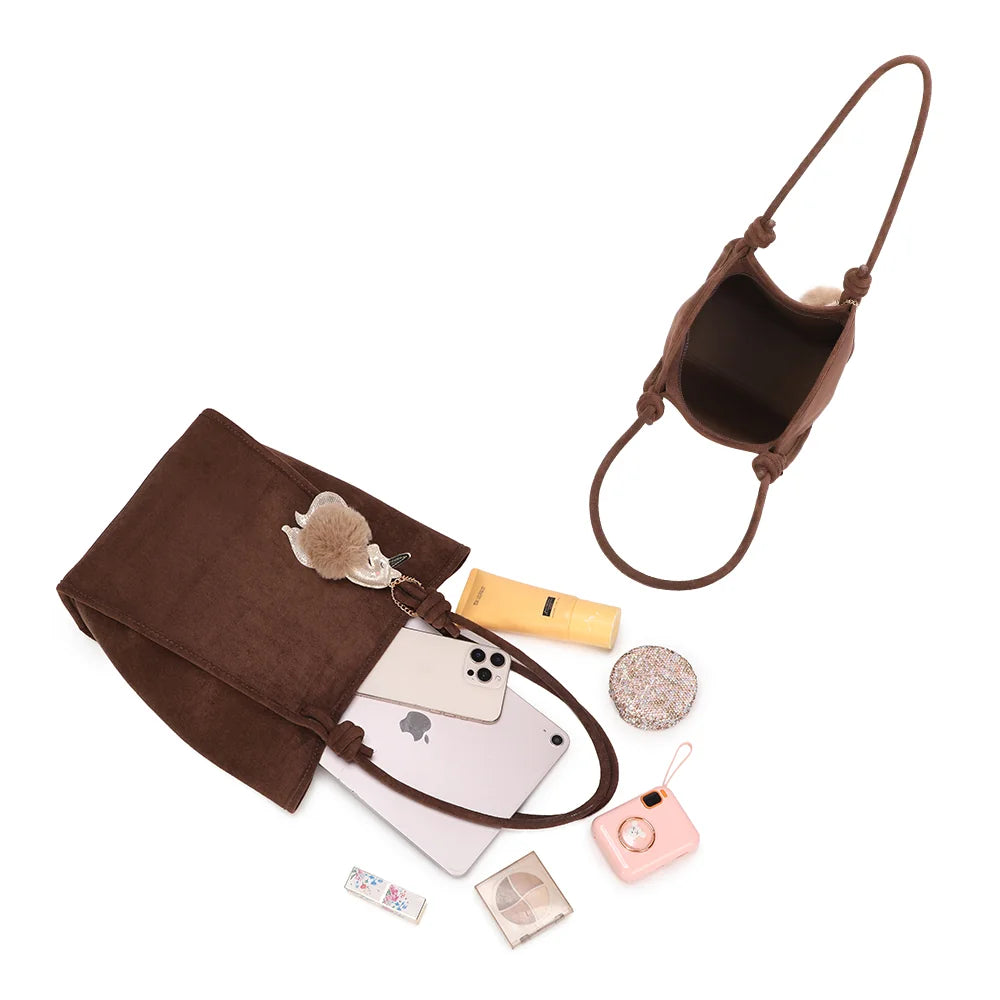 Intérieur du Noéva café : un grand compartiment unique pour téléphone, tablette, trousse et essentiels – réf. M-9455