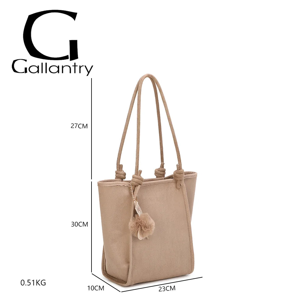 Dimensions du Noéva taupe : 23 × 10 × 30 cm, anses de 27 cm de hauteur de chute, 0,51 kg – réf. M-9455