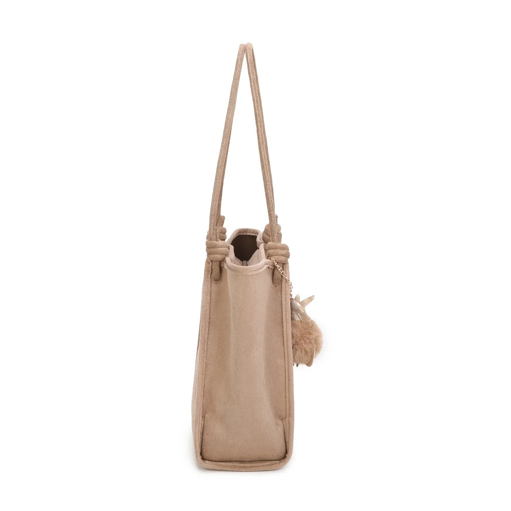 Profil du Noéva taupe : soufflet latéral et format vertical de 10 cm de profondeur, facile à glisser partout – réf. M-9455