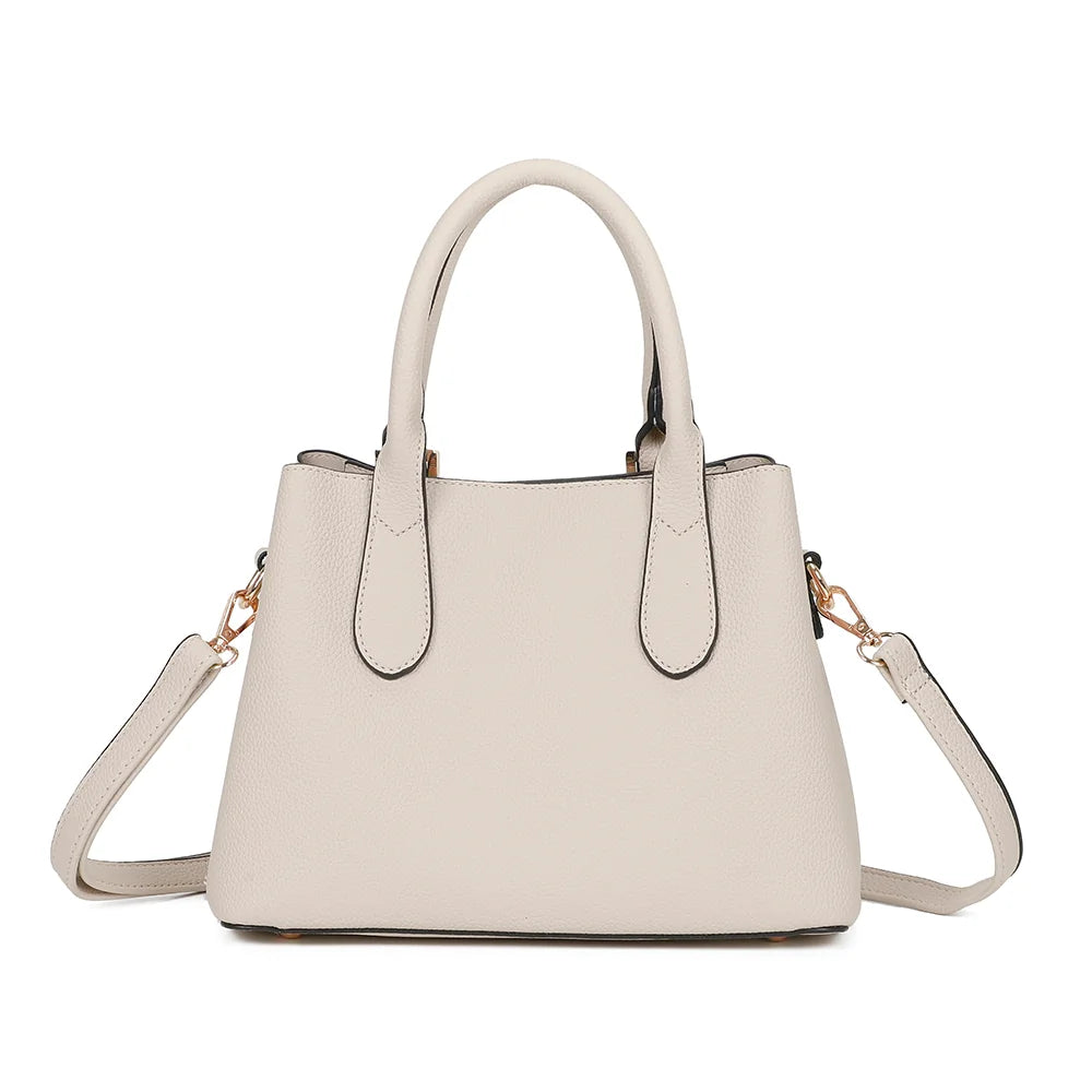 Nola beige vu de dos, simili cuir grainé uni et deux anses arrondies pour un port main élégant – réf. R-1948