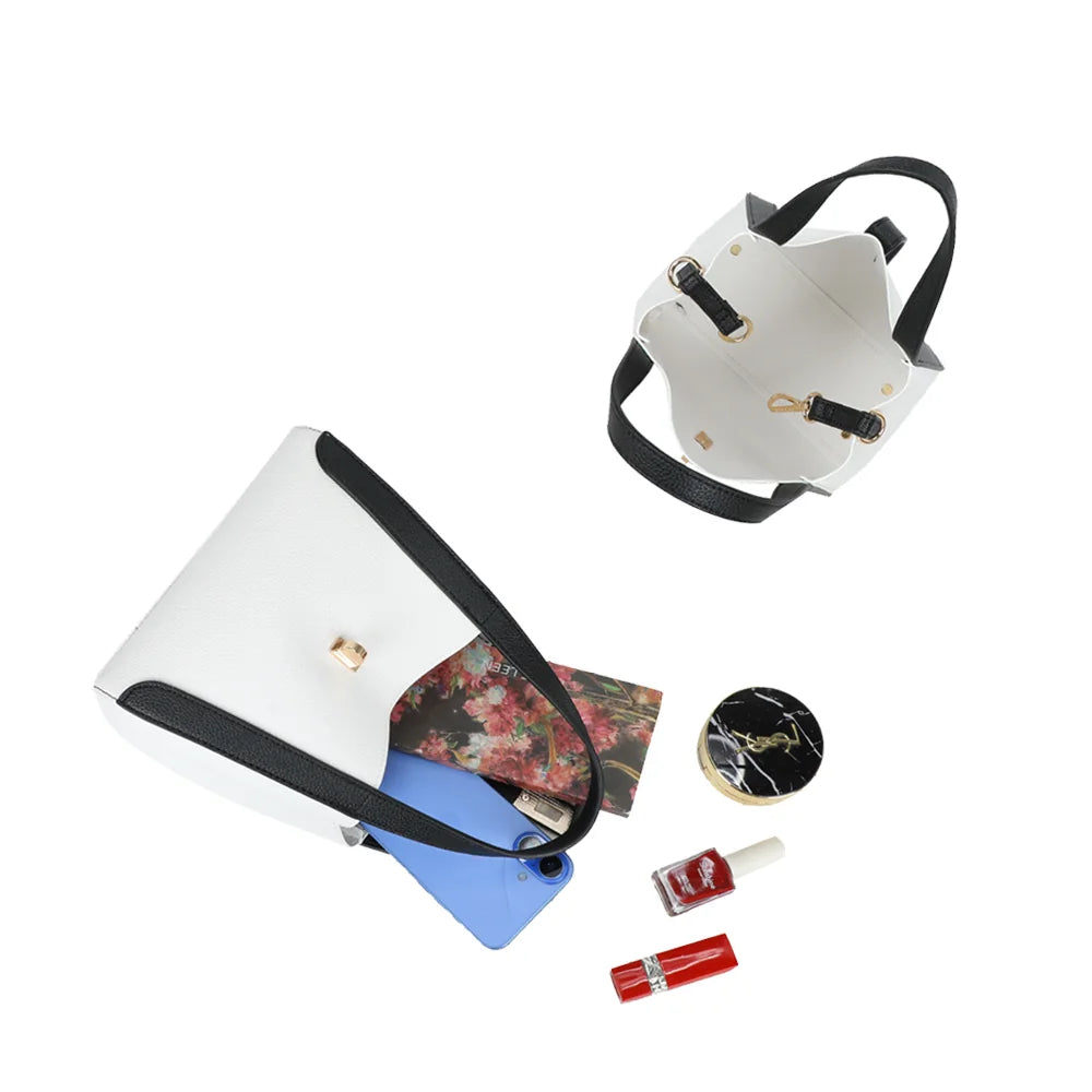 Intérieur du Nora blanc/noir : compartiment principal pour téléphone, portefeuille, clés et maquillage – réf. DQ-8718