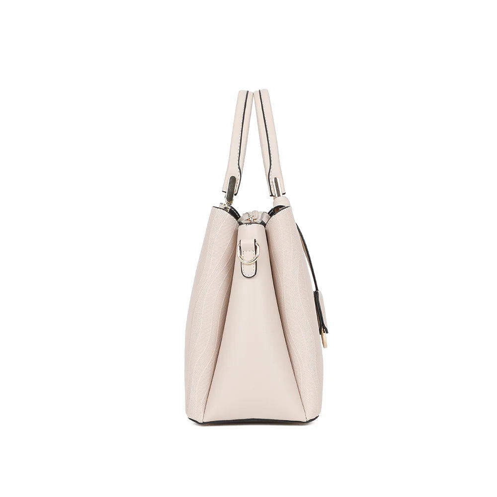 Profil du Noréline beige : soufflet de 13 cm et attache latérale pour la bandoulière amovible – réf. DQ-8697