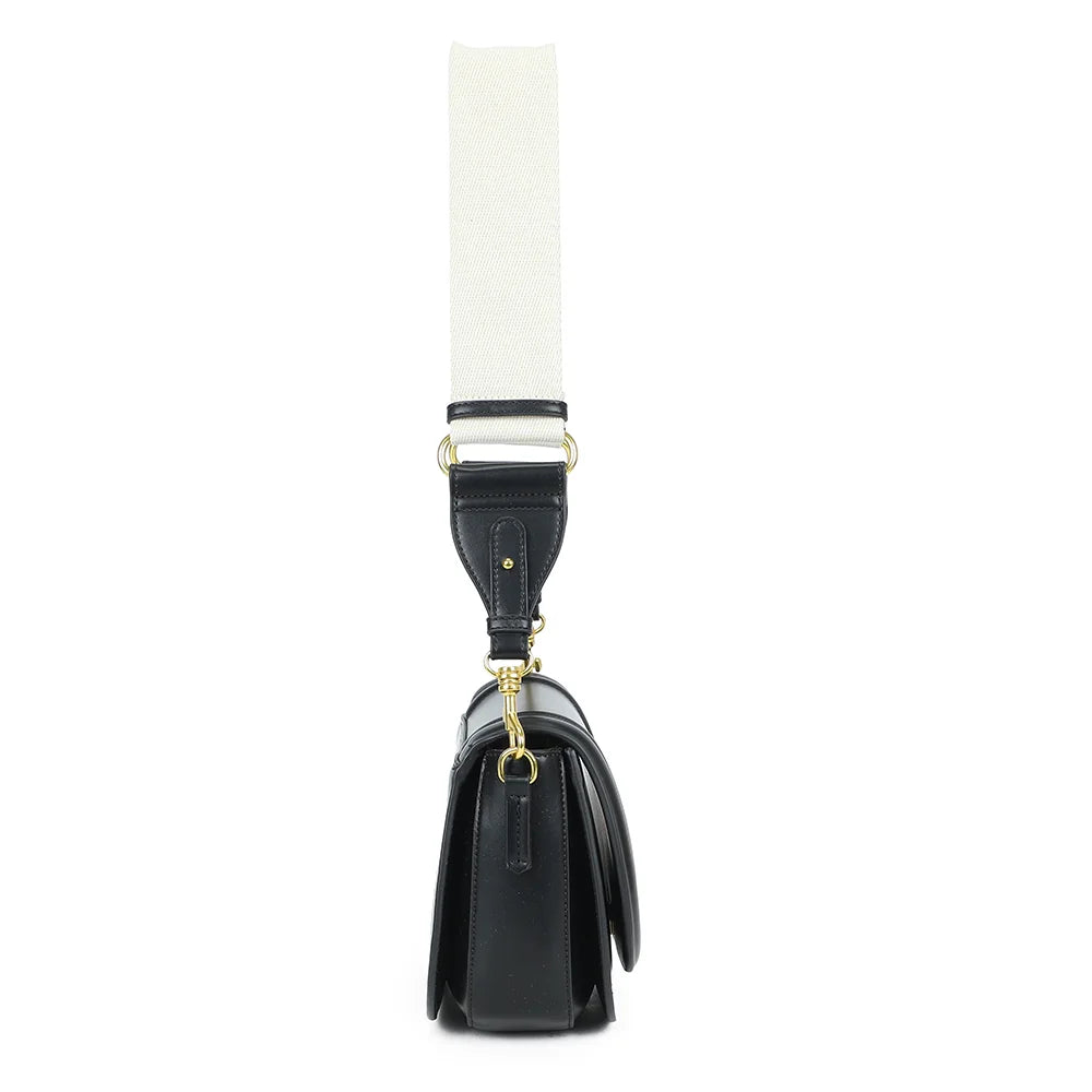 Profil du Nova Loop noir : format compact de 8 cm de profondeur, rabat bombé