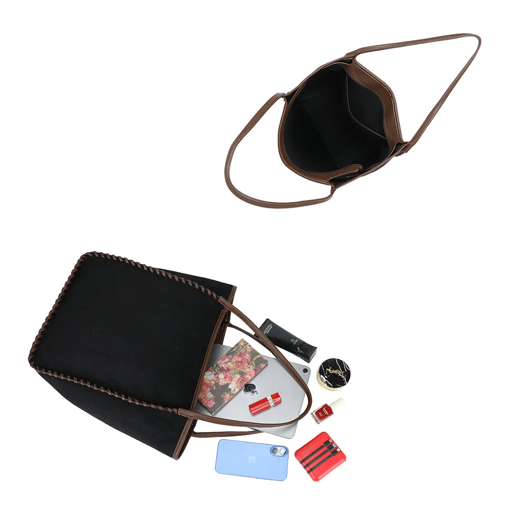 Intérieur du Nubia noir : grand compartiment, poche zippée et ouverture large – réf. R-2028