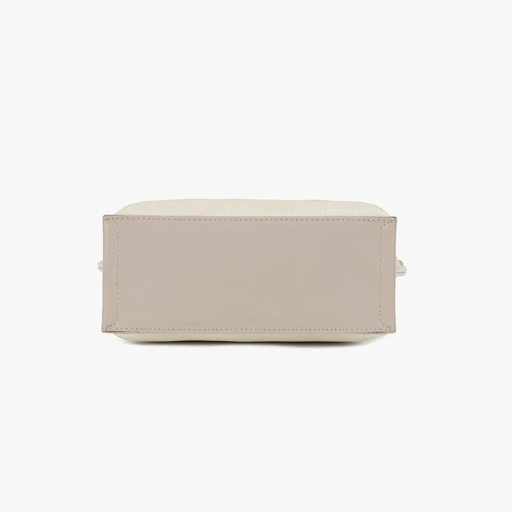 Dessous du Nude Canvas beige/taupe, base bordée d’un liseré synthétique contrasté – réf. R-1987-1