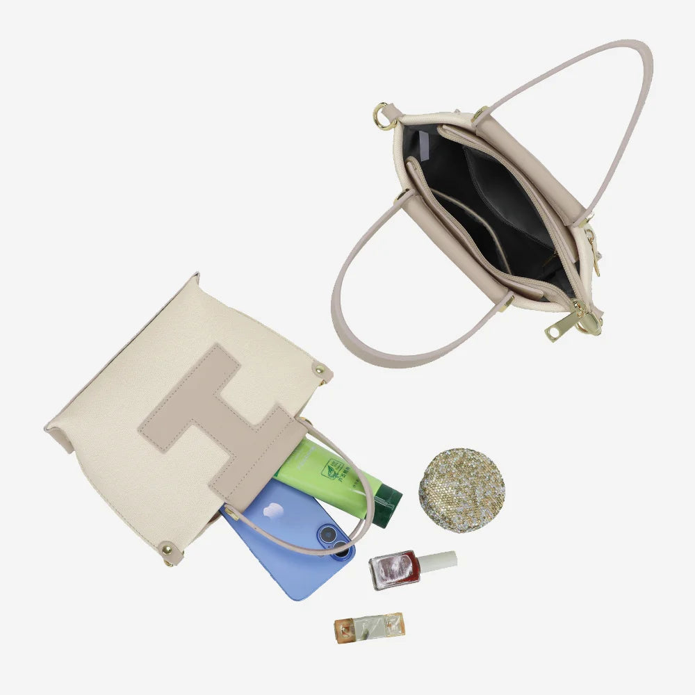 Intérieur du Nude Canvas beige/taupe : compartiment doublé pour téléphone et petits essentiels – réf. R-1987-1