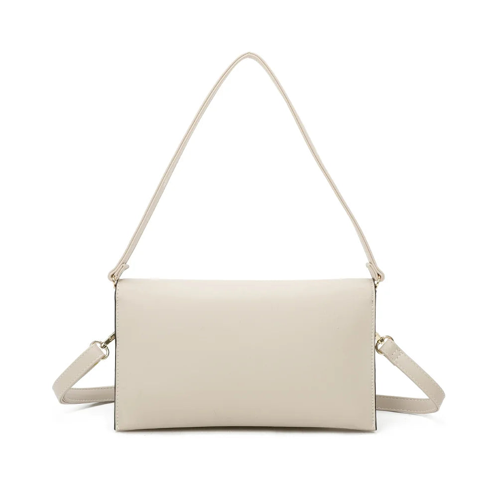 Dos de la pochette Opale beige, lignes nettes et anse d’épaule fixée par anneaux dorés – réf. R-1699