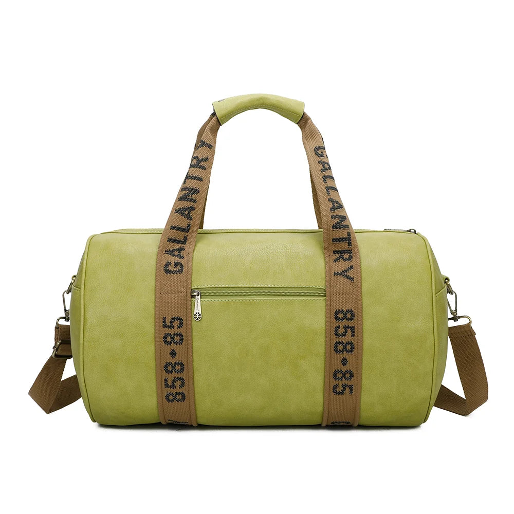 Dos du Polochon vert pomme : sangles siglées qui font le tour du sac et fermeture zippée sur le dessus – réf. Z-83049