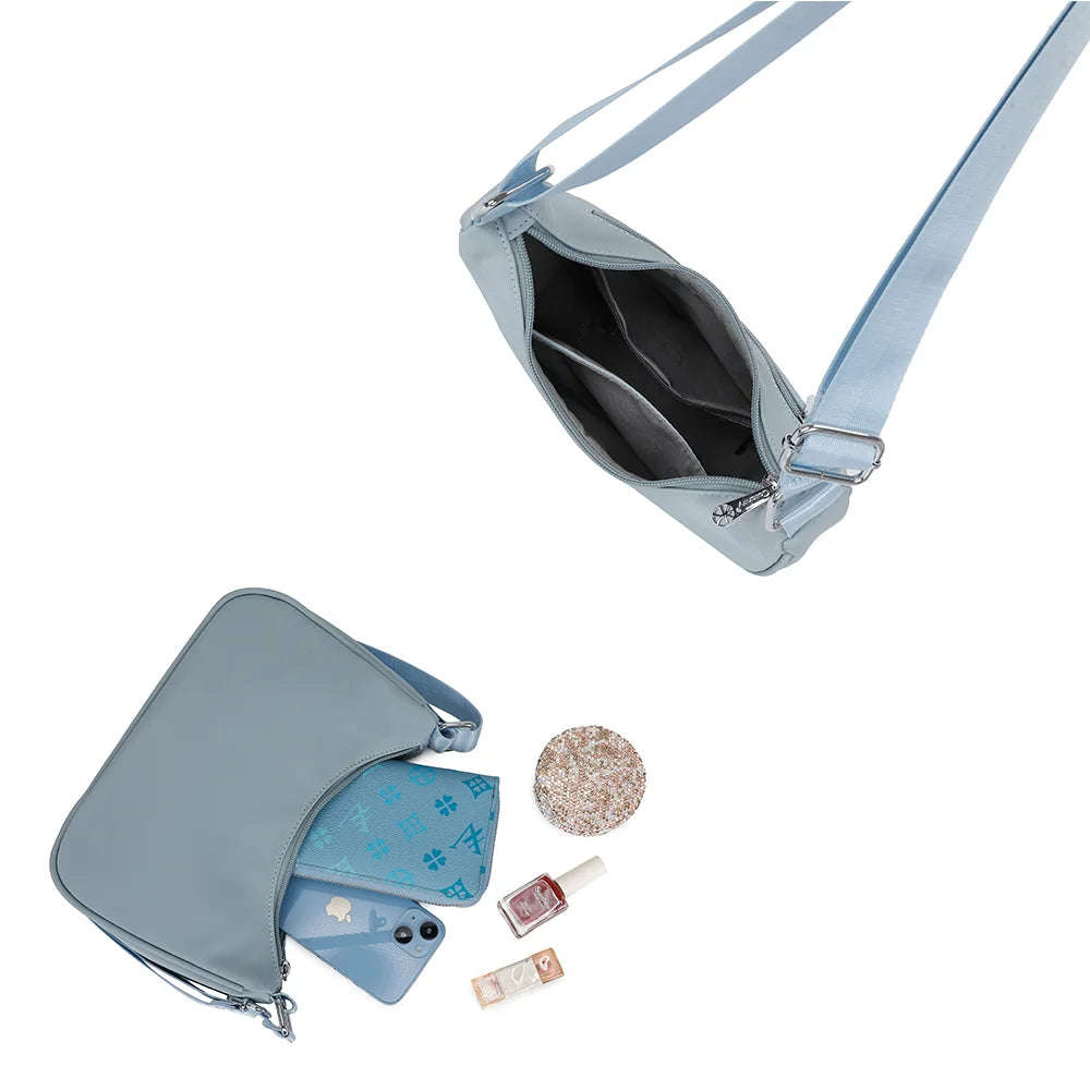 Intérieur du Redy bleu clair : compartiment zippé avec poches pour vos essentiels – réf. R-1956