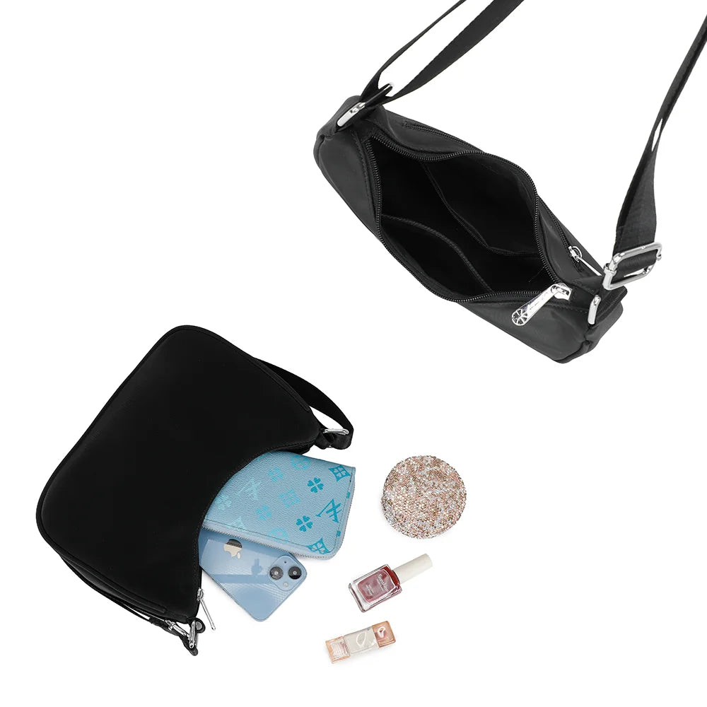 Intérieur du Redy noir : compartiment zippé avec poches pour vos essentiels – réf. R-1956