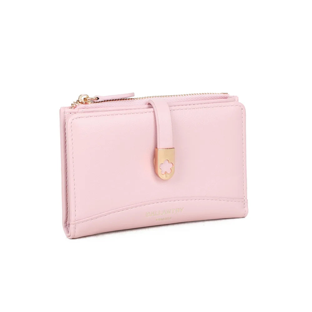 Portefeuille Ruby rose de trois quarts : patte à fermoir fleur doré et zip sur le dessus – réf. SF-69057