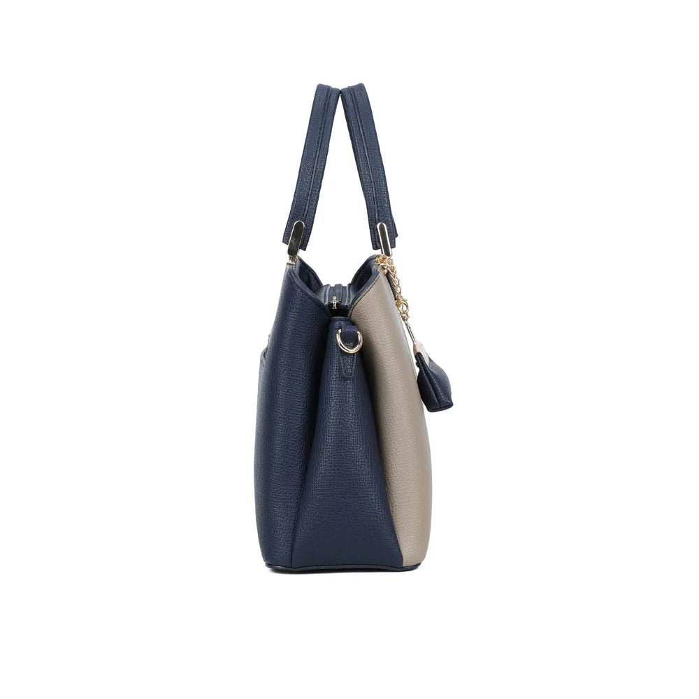 Profil du Serena Duo marine : soufflet de 12 cm et anneau doré pour accrocher la bandoulière amovible – réf. M-9130-A