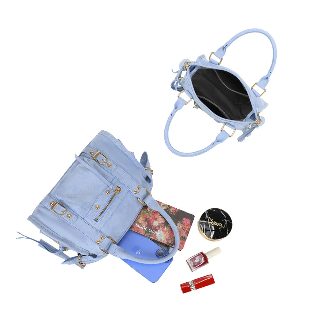 Intérieur du Skyla en bleu clair : fermeture éclair, doublure synthétique et poches plaquées pour vos essentiels – réf. Z-1979-6A