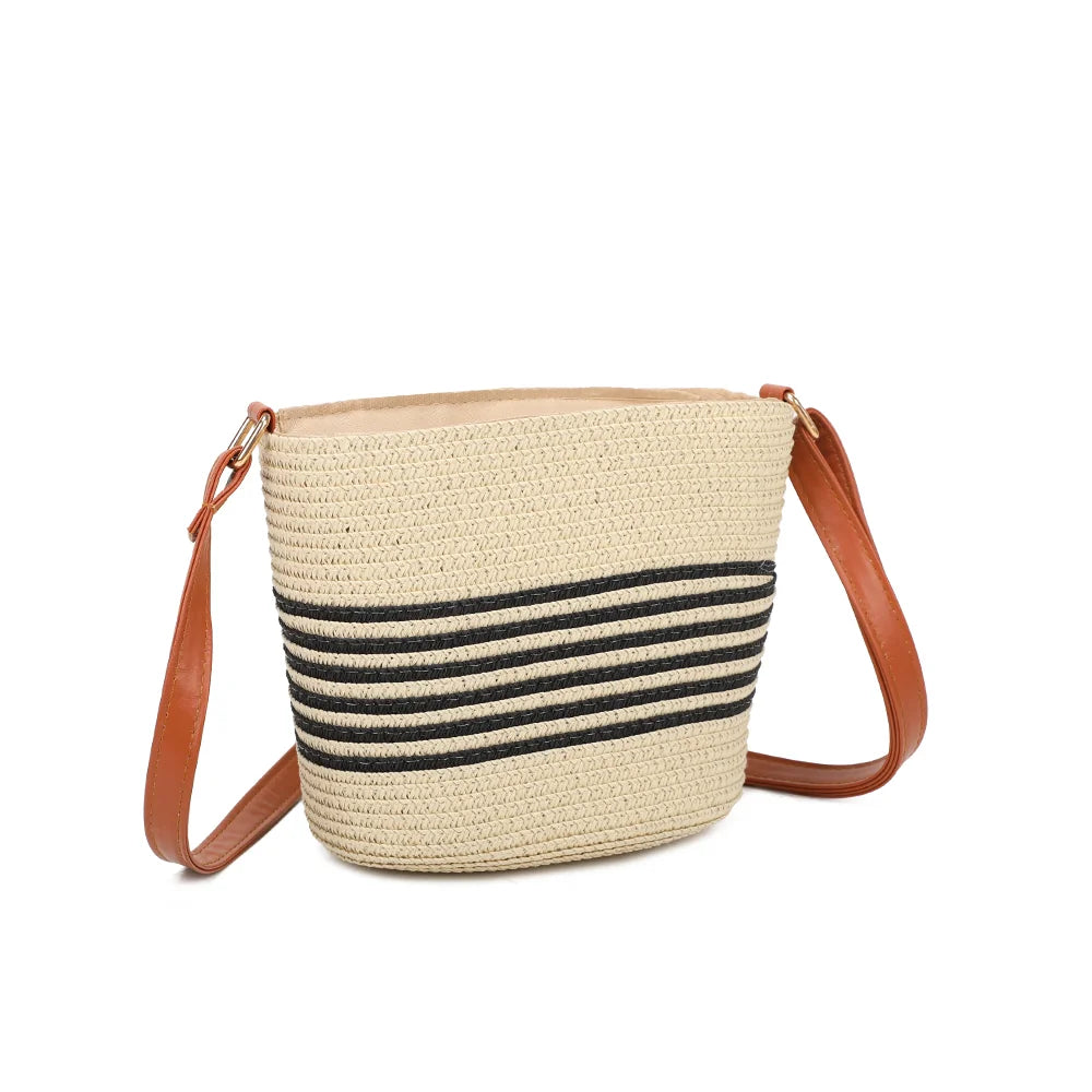 Solea beige/noir vu de trois-quarts, forme seau arrondie et attaches dorées de la bandoulière – réf. JA-29001-1