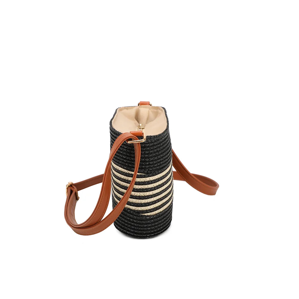 Profil du Solea noir/beige : format compact de 9 cm de profondeur et bandoulière réglable camel – réf. JA-29001-1