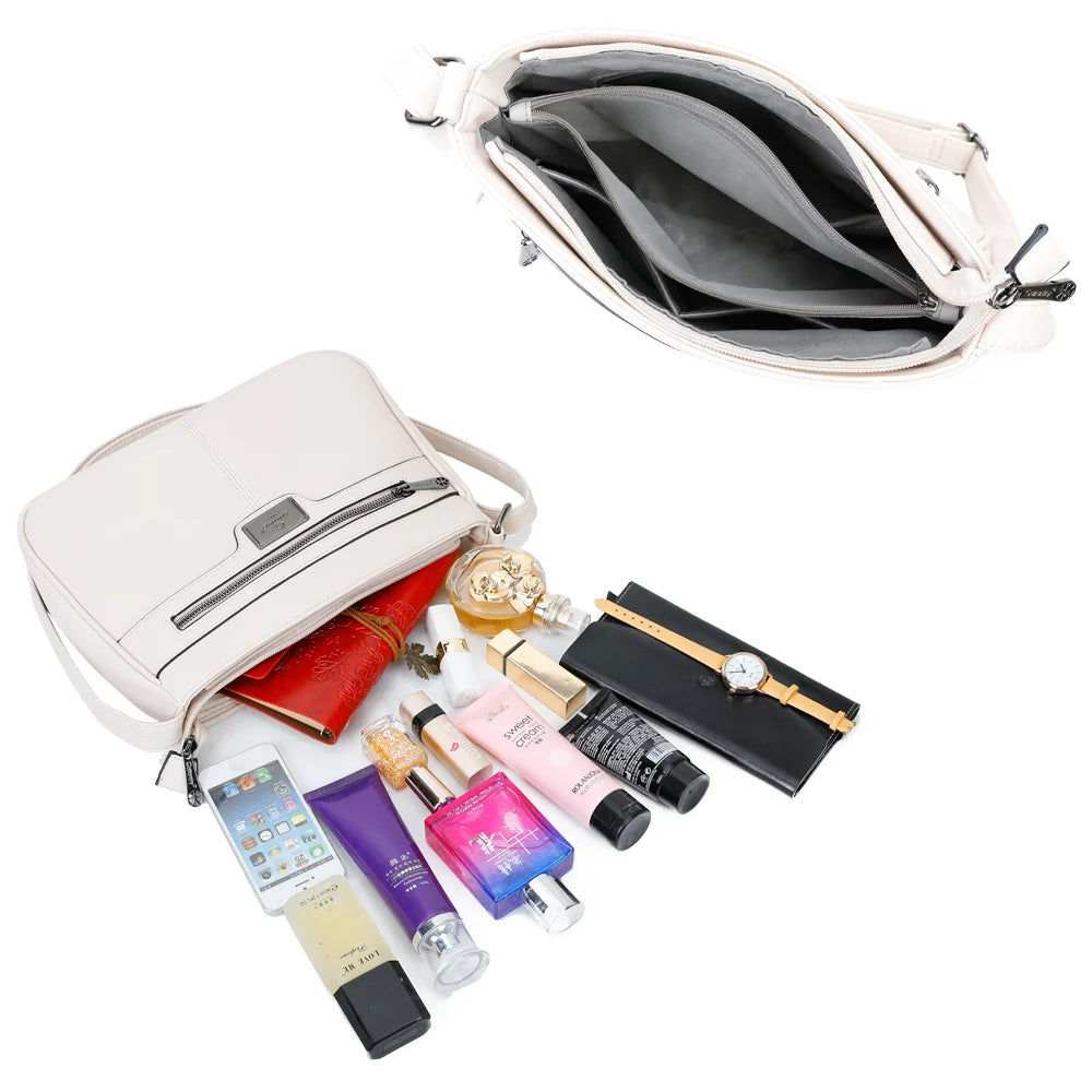 Intérieur du Sora Urban beige : plusieurs compartiments zippés pour téléphone, clés et maquillage – réf. Z-83016